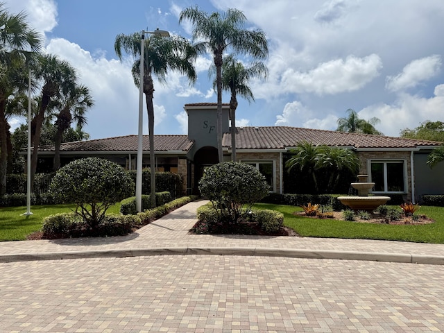 7906 Rockport Cir, Lake Worth, FL 33467 - view of front of house with a tile roof and a front yard