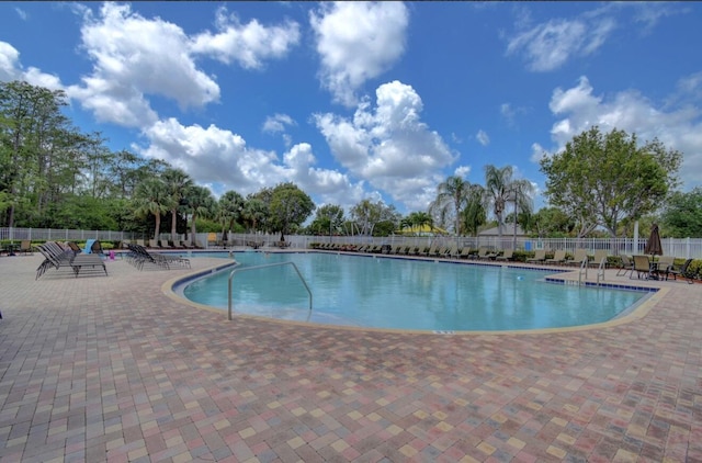 7906 Rockport Cir, Lake Worth, FL 33467 - community pool featuring a patio area