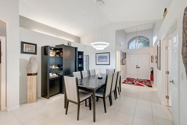 7566 San Pedro St, Boynton Beach, FL 33437 - dining room with high vaulted ceiling, a chandelier, and light tile patterned flooring