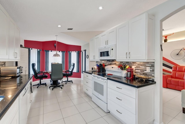 7566 San Pedro St, Boynton Beach, FL 33437 - kitchen featuring white appliances, decorative backsplash, white cabinetry, vaulted ceiling, and recessed lighting