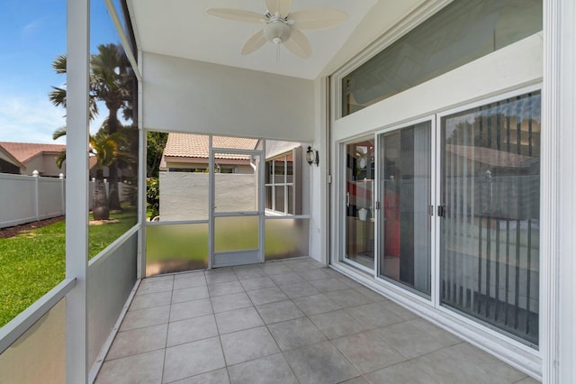 7566 San Pedro St, Boynton Beach, FL 33437 - unfurnished sunroom featuring a ceiling fan