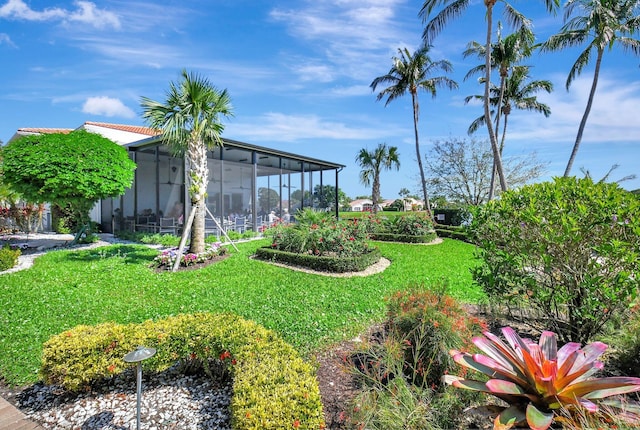 7566 San Pedro St, Boynton Beach, FL 33437 - view of green lawn with a sunroom