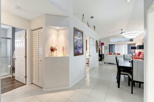 7566 San Pedro St, Boynton Beach, FL 33437 - hallway with light tile patterned flooring and baseboards
