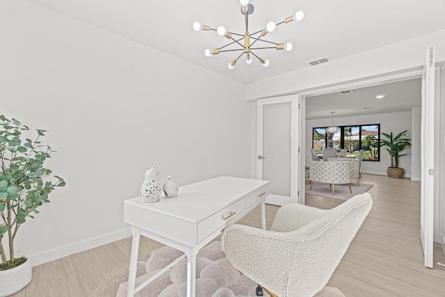 812 Chapel Hill Blvd, Boynton Beach, FL 33435 - office with a chandelier, baseboards, and light wood-style floors