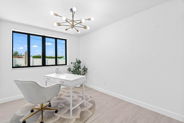 812 Chapel Hill Blvd, Boynton Beach, FL 33435 - office with a chandelier, light wood-style flooring, and baseboards