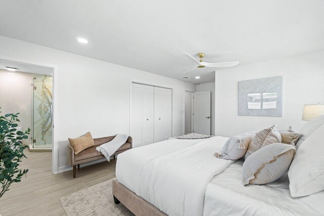 812 Chapel Hill Blvd, Boynton Beach, FL 33435 - bedroom featuring light wood finished floors, a closet, ensuite bathroom, recessed lighting, and ceiling fan