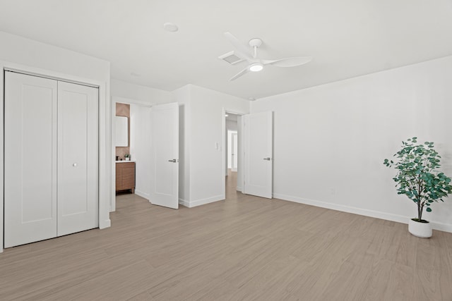 812 Chapel Hill Blvd, Boynton Beach, FL 33435 - unfurnished bedroom with light wood-type flooring, a closet, and a ceiling fan