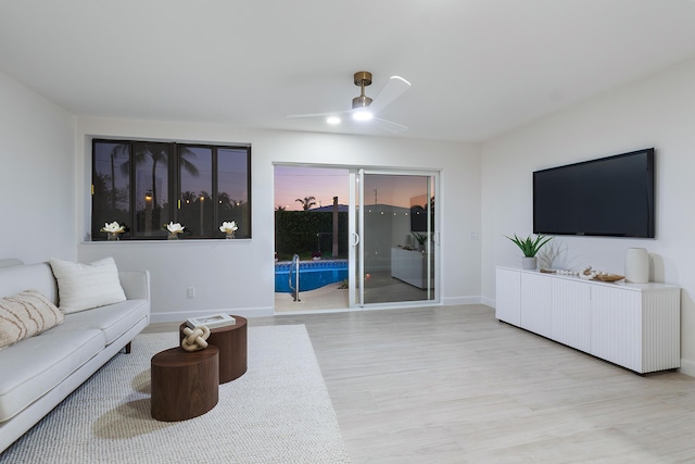 812 Chapel Hill Blvd, Boynton Beach, FL 33435 - living room featuring wood finished floors, a ceiling fan, and baseboards
