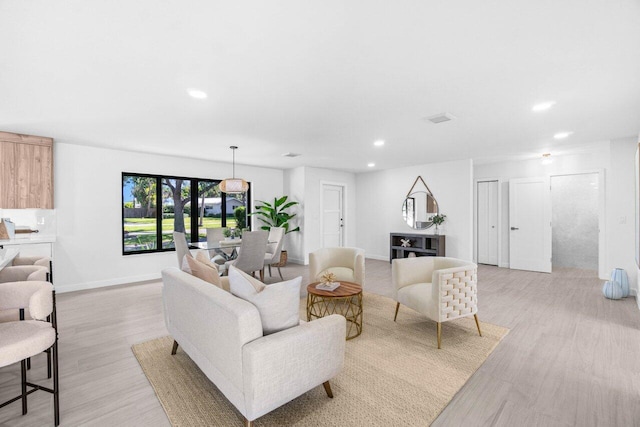 812 Chapel Hill Blvd, Boynton Beach, FL 33435 - living area featuring light wood finished floors, recessed lighting, and baseboards