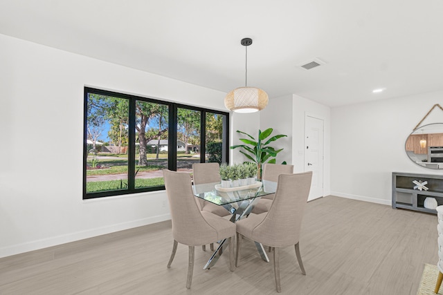 812 Chapel Hill Blvd, Boynton Beach, FL 33435 - dining room with baseboards and light wood-type flooring