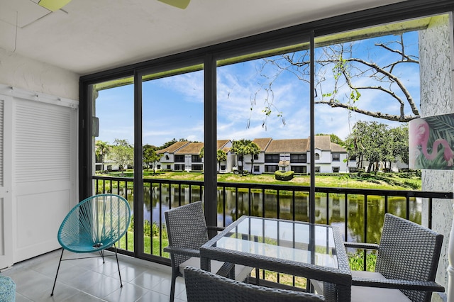 5451 Verona Dr Unit M, Boynton Beach, FL 33437 - unfurnished sunroom with a water view and a residential view