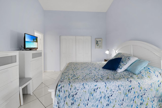 5451 Verona Dr Unit M, Boynton Beach, FL 33437 - bedroom with light tile patterned floors, a closet, and a towering ceiling