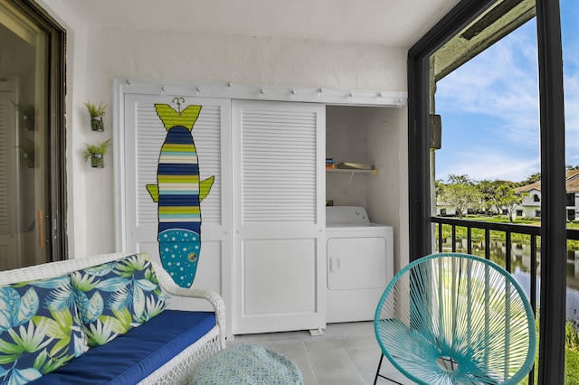 5451 Verona Dr Unit M, Boynton Beach, FL 33437 - laundry area featuring washer / clothes dryer and light tile patterned floors