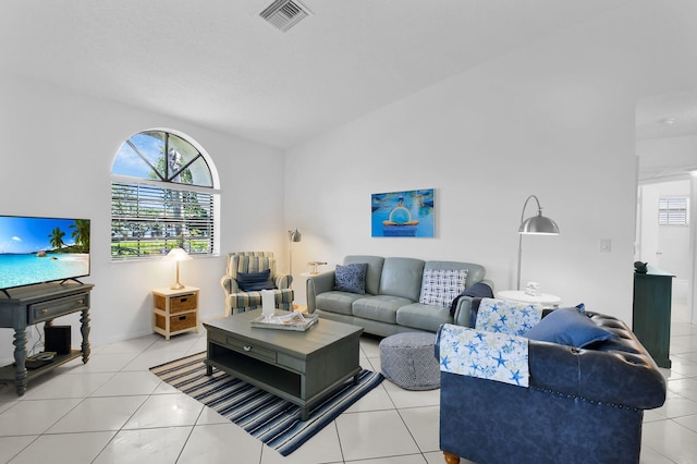 5451 Verona Dr Unit M, Boynton Beach, FL 33437 - living area featuring tile patterned floors and vaulted ceiling