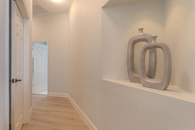 13664 Kiltie Ct, Delray Beach, FL 33446 - hallway with light wood finished floors and baseboards