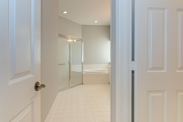 13664 Kiltie Ct, Delray Beach, FL 33446 - bathroom featuring a stall shower, tile patterned floors, a garden tub, and recessed lighting