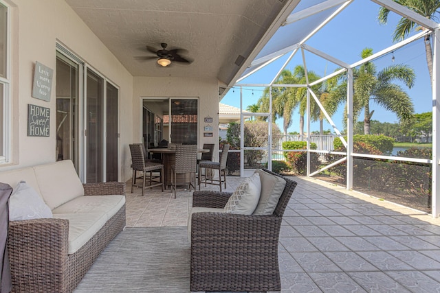 13664 Kiltie Ct, Delray Beach, FL 33446 - view of patio / terrace with ceiling fan, glass enclosure, and an outdoor hangout area