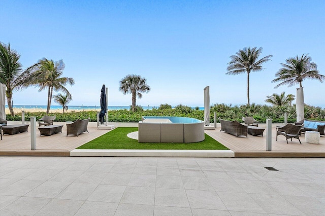 1500 S Ocean Blvd Unit 804, Boca Raton, FL 33432 - view of home's community featuring an outdoor hangout area, a deck with water view, and a patio area