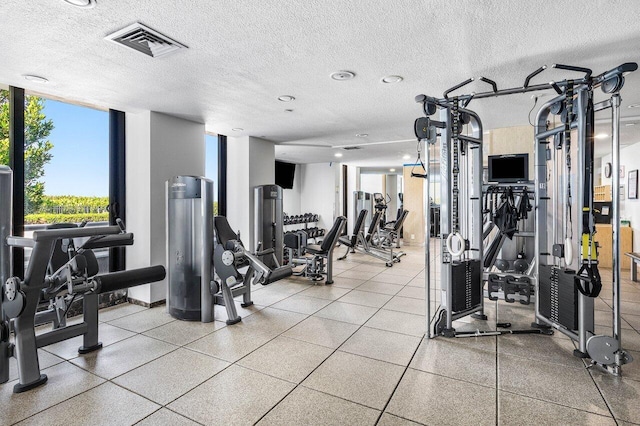 1500 S Ocean Blvd Unit 804, Boca Raton, FL 33432 - exercise room featuring a textured ceiling