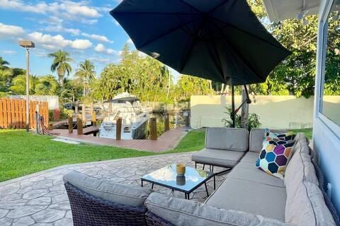 2809 SW 46th St, Dania Beach, FL 33312 - view of patio featuring outdoor lounge area