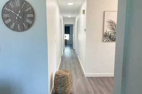 2809 SW 46th St, Dania Beach, FL 33312 - hall featuring wood finished floors and baseboards