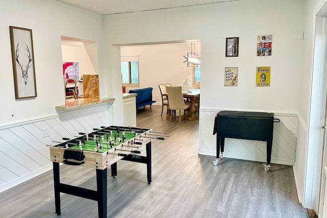 2809 SW 46th St, Dania Beach, FL 33312 - game room with wood finished floors, wainscoting, and a sink
