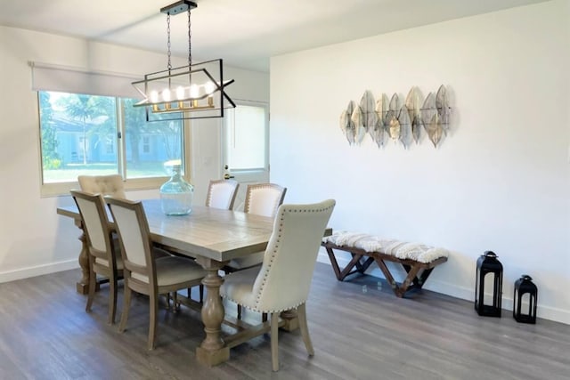 2809 SW 46th St, Dania Beach, FL 33312 - dining space with wood finished floors, a chandelier, and baseboards