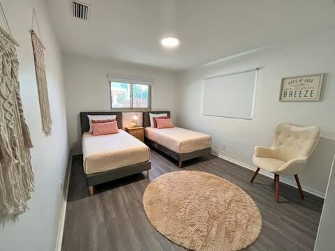 2809 SW 46th St, Dania Beach, FL 33312 - bedroom featuring baseboards and wood finished floors