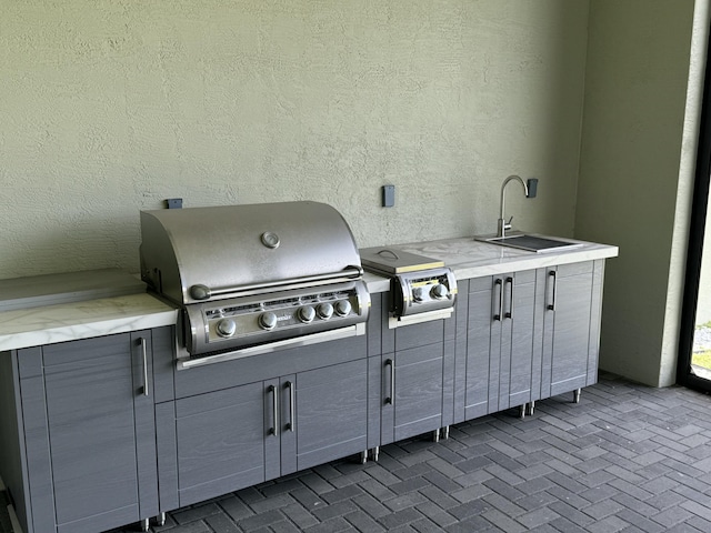 4662 Estates Cir, Westlake, FL 33470 - view of patio with grilling area, a sink, and exterior kitchen