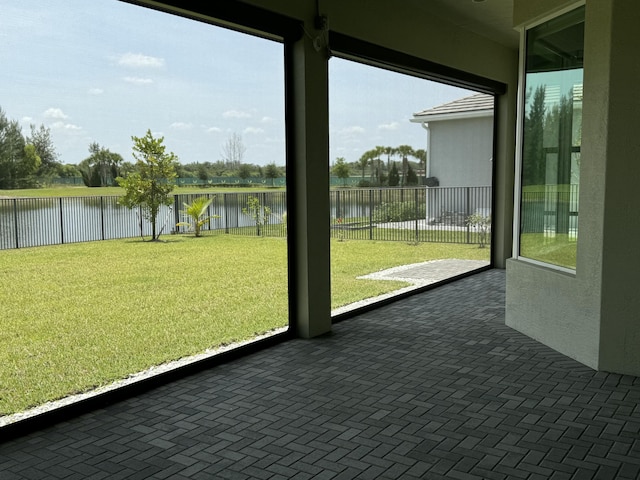 4662 Estates Cir, Westlake, FL 33470 - unfurnished sunroom with a water view