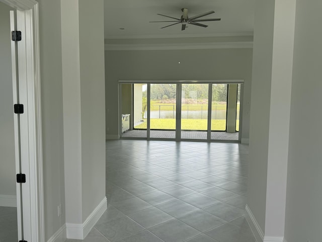 4662 Estates Cir, Westlake, FL 33470 - spare room featuring a ceiling fan, light tile patterned floors, crown molding, and baseboards