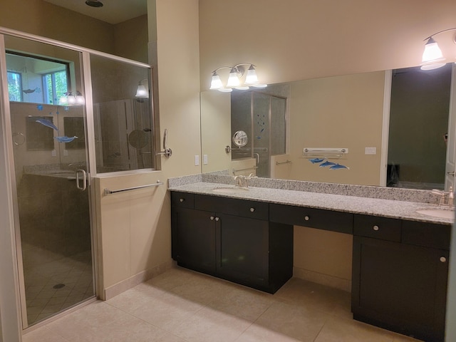 4295 55th St, Vero Beach, FL 32967 - bathroom with double vanity, a stall shower, and tile patterned flooring