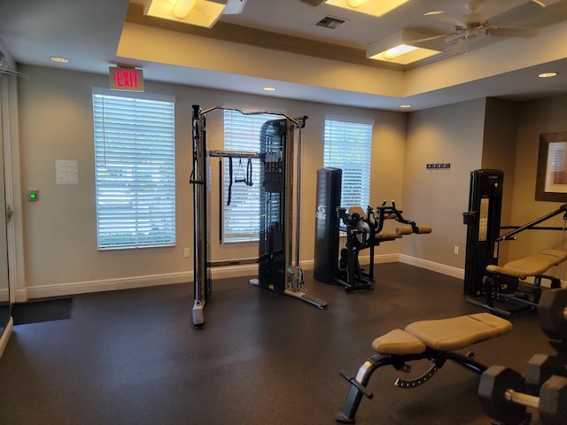 4295 55th St, Vero Beach, FL 32967 - workout area with ceiling fan, baseboards, a raised ceiling, and recessed lighting