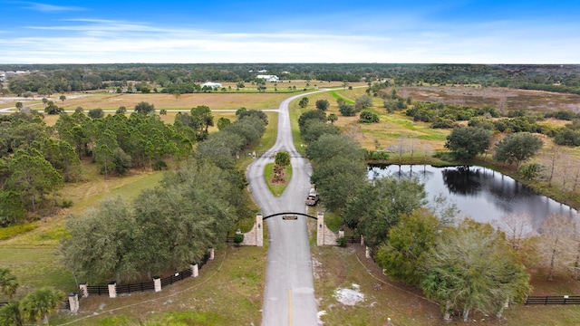 13273 SE 26th Ln, Okeechobee, FL 34974 - aerial view of property and surrounding area with a large body of water, a tree filled landscape, and rural landscape