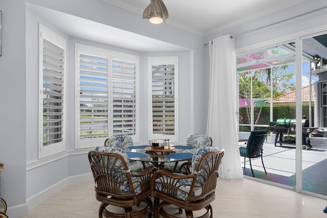 550 SW Sanctuary Dr, Port Saint Lucie, FL 34986 - dining space with crown molding and baseboards