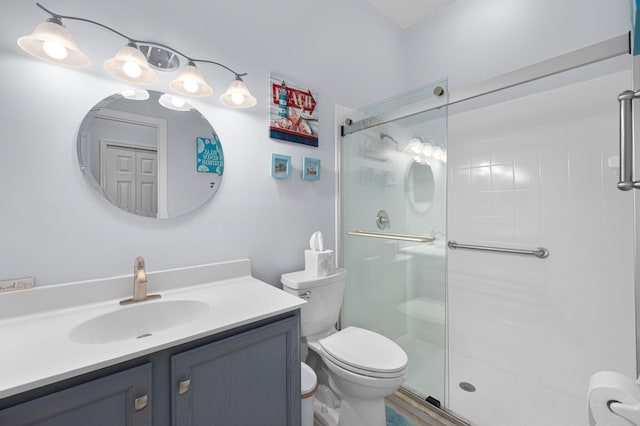 550 SW Sanctuary Dr, Port Saint Lucie, FL 34986 - full bath with toilet, a stall shower, and vanity