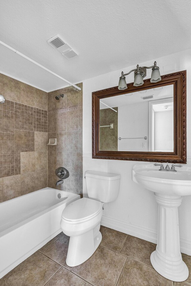 21895 Lake Forest Cir Unit 201, Boca Raton, FL 33433 - bathroom featuring tile patterned floors, toilet, shower / bathtub combination, and baseboards