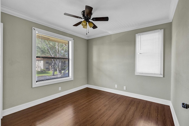 21895 Lake Forest Cir Unit 201, Boca Raton, FL 33433 - spare room with dark wood-type flooring, baseboards, crown molding, and ceiling fan