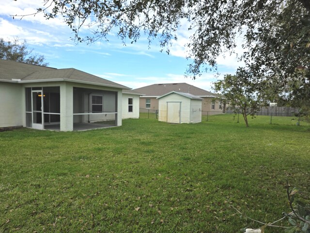 4365 SW Appleseed Rd, Port Saint Lucie, FL 34953 - view of yard with a sunroom