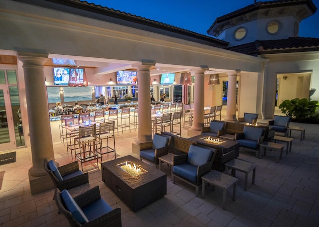 7919 L Aquila Way, Delray Beach, FL 33446 - view of patio featuring an outdoor living space with a fire pit