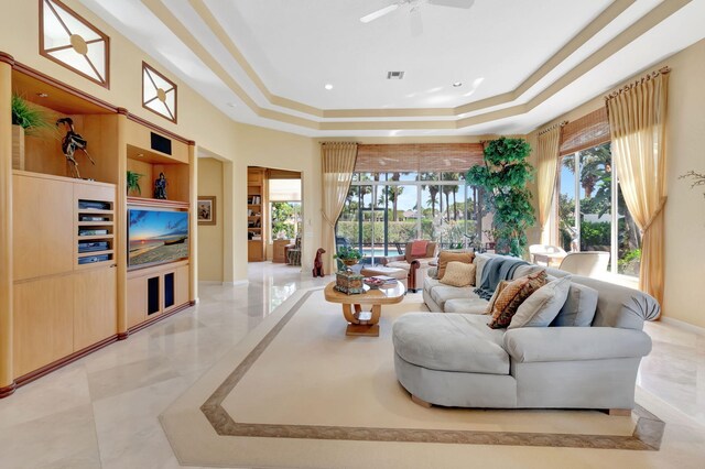 7919 L Aquila Way, Delray Beach, FL 33446 - living area with a raised ceiling, a ceiling fan, and recessed lighting