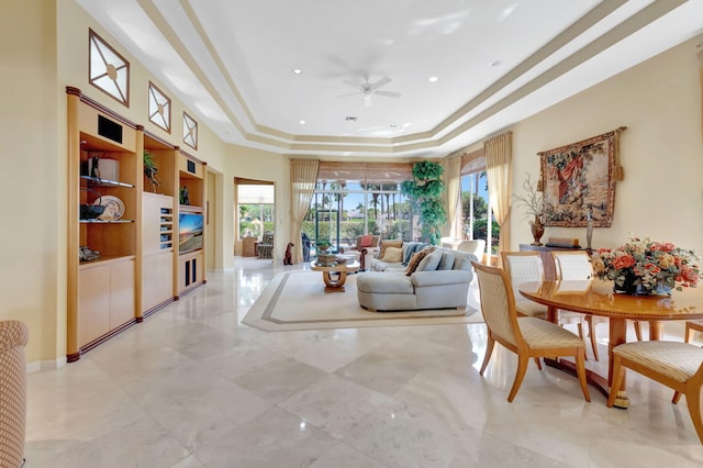 7919 L Aquila Way, Delray Beach, FL 33446 - living area with a tray ceiling, a ceiling fan, and recessed lighting