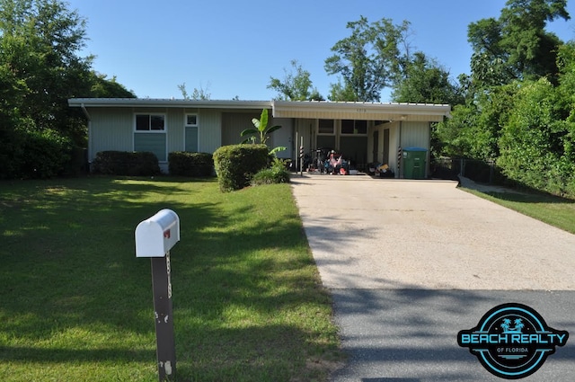 4318 7th Ave, Marianna, FL 32446 - view of front of property with a front lawn and driveway