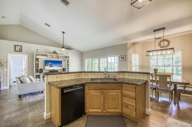 15048 85th Rd N, The Acreage, FL 33470 - kitchen featuring black dishwasher, a sink, open floor plan, lofted ceiling, and a kitchen island with sink