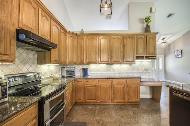15048 85th Rd N, The Acreage, FL 33470 - kitchen with double oven range, lofted ceiling, under cabinet range hood, dishwasher, and decorative backsplash