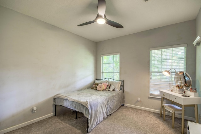 15048 85th Rd N, The Acreage, FL 33470 - bedroom with baseboards, carpet floors, and ceiling fan
