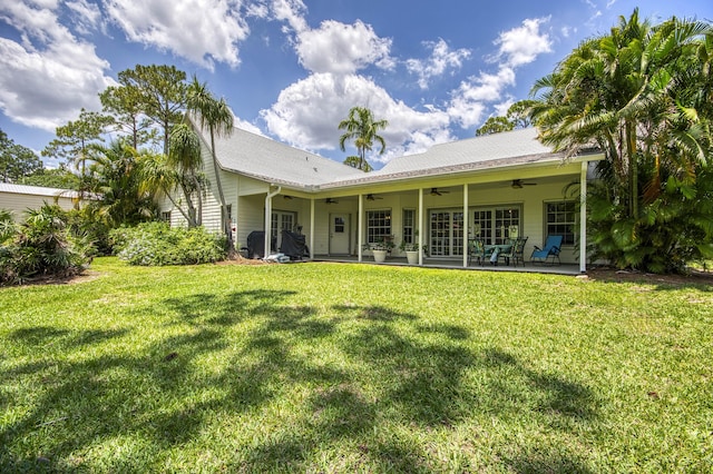 15048 85th Rd N, The Acreage, FL 33470 - rear view of property with ceiling fan, a yard, and a patio area