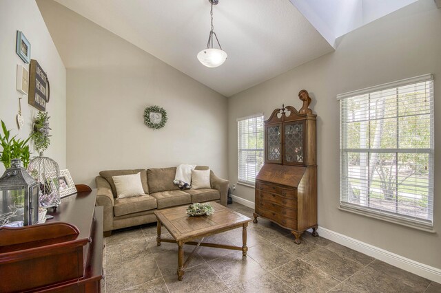 15048 85th Rd N, The Acreage, FL 33470 - living room with baseboards and high vaulted ceiling
