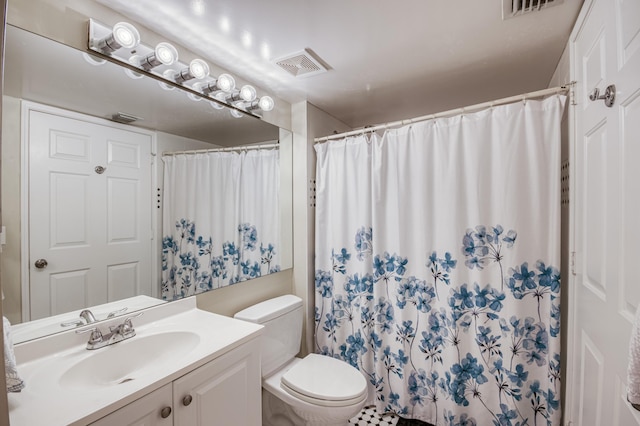 236 Village Blvd Unit 1303, Tequesta, FL 33469 - full bathroom featuring toilet, vanity, and a shower with curtain