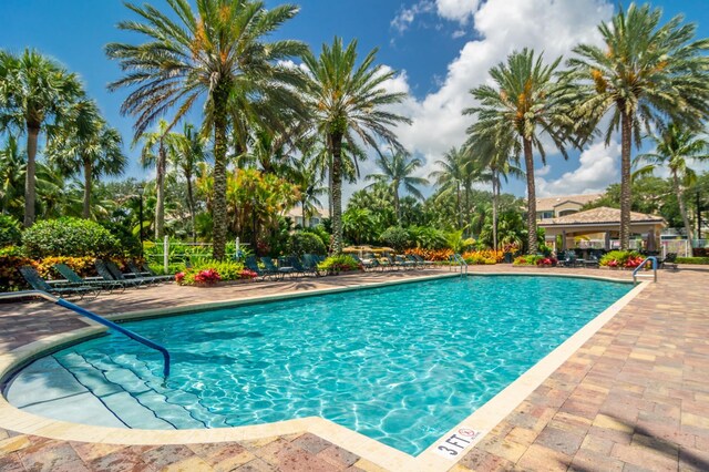 236 Village Blvd Unit 1303, Tequesta, FL 33469 - community pool featuring a patio area